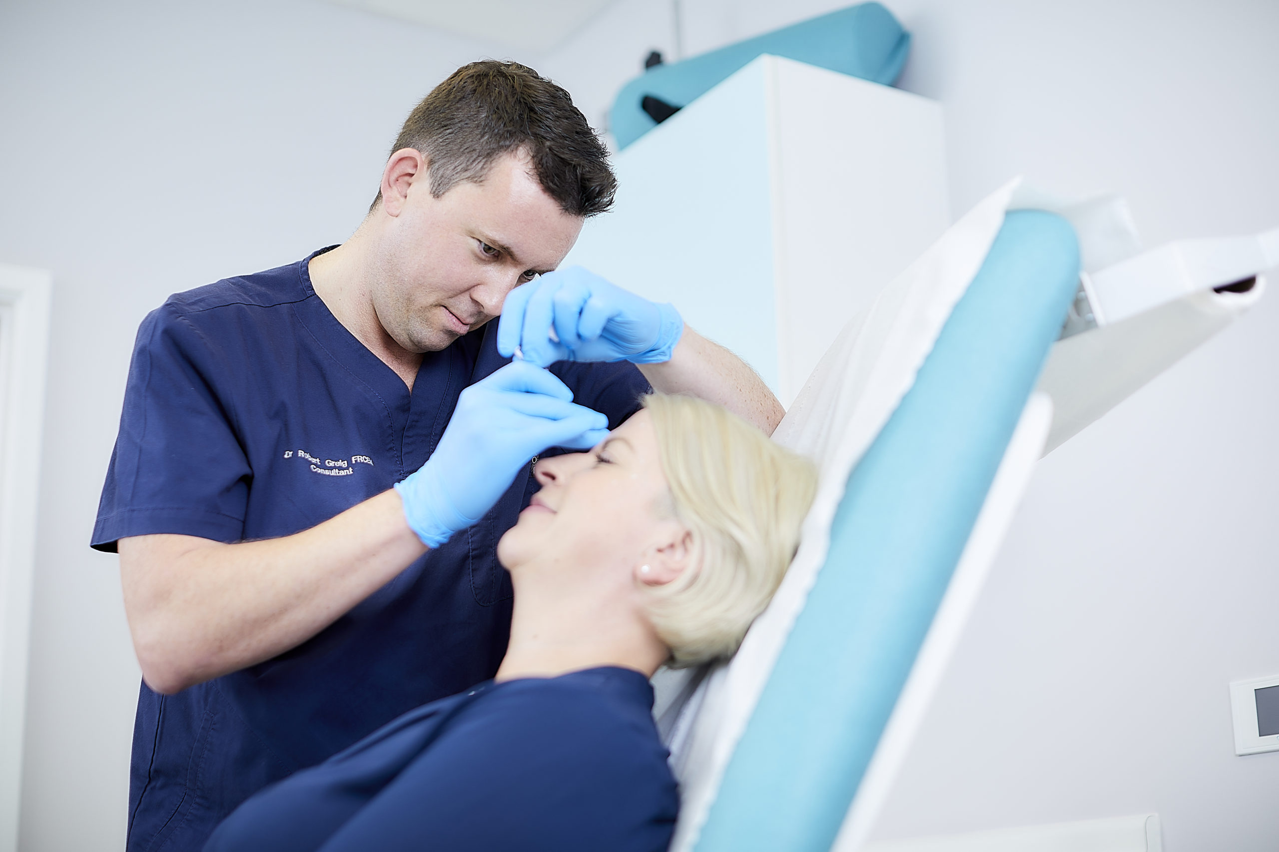 Dr Rob Greig providing personal clinical care in his Jersey clinic